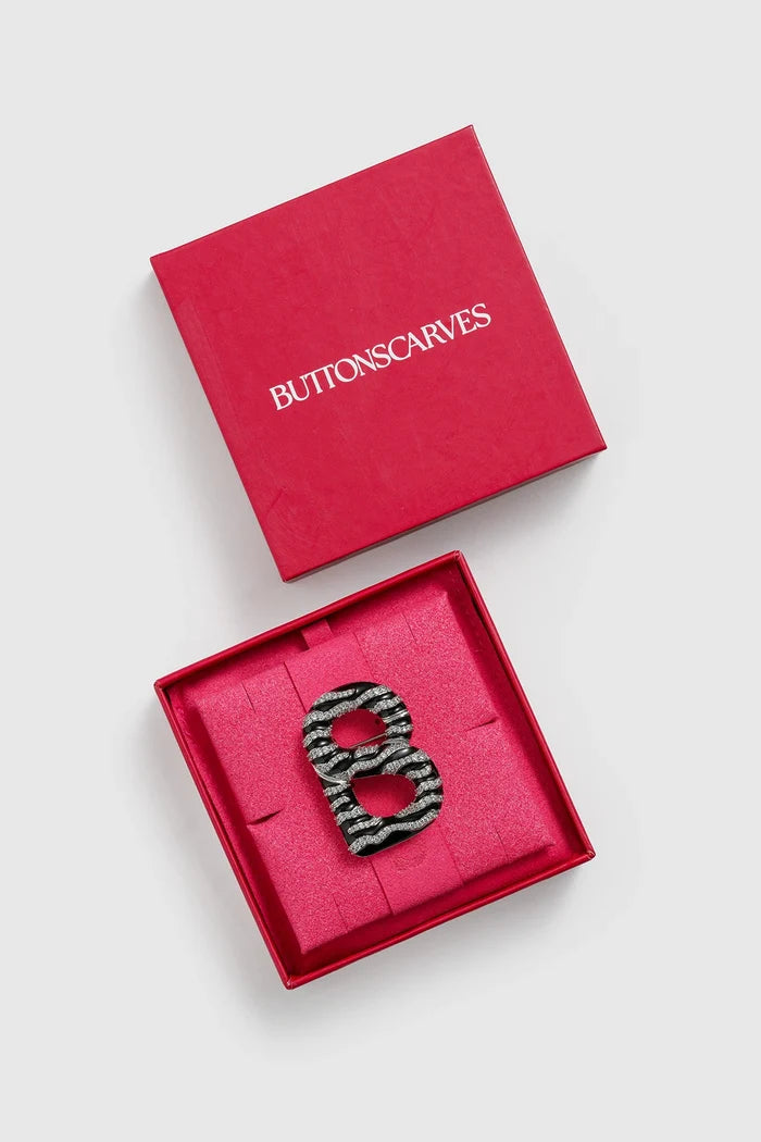 signature maris brooch in black silver by buttonscarves