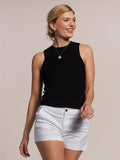 Black ribbed sleeveless knit tank top with scoop neck, front view on woman.
