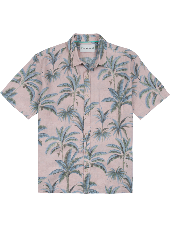 Light pink palm tree-print short-sleeve linen button-up shirt with collar and front pocket, front view.