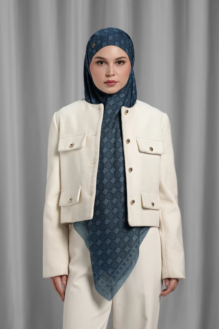 maritime blue square scarf by buttonscarves styled in a modern hijab look