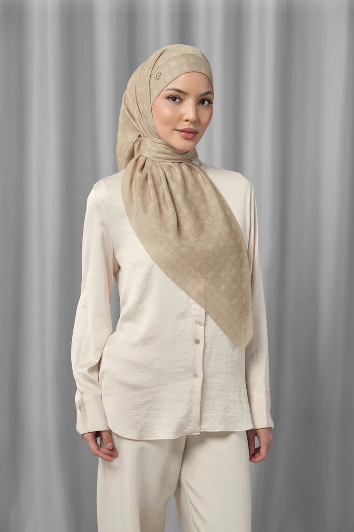 sand square scarf by buttonscarves styled in a modern hijab look