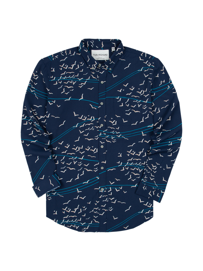 Navy shirt with white bird and blue stripe print, button-up, long sleeves, Flat lay front view.