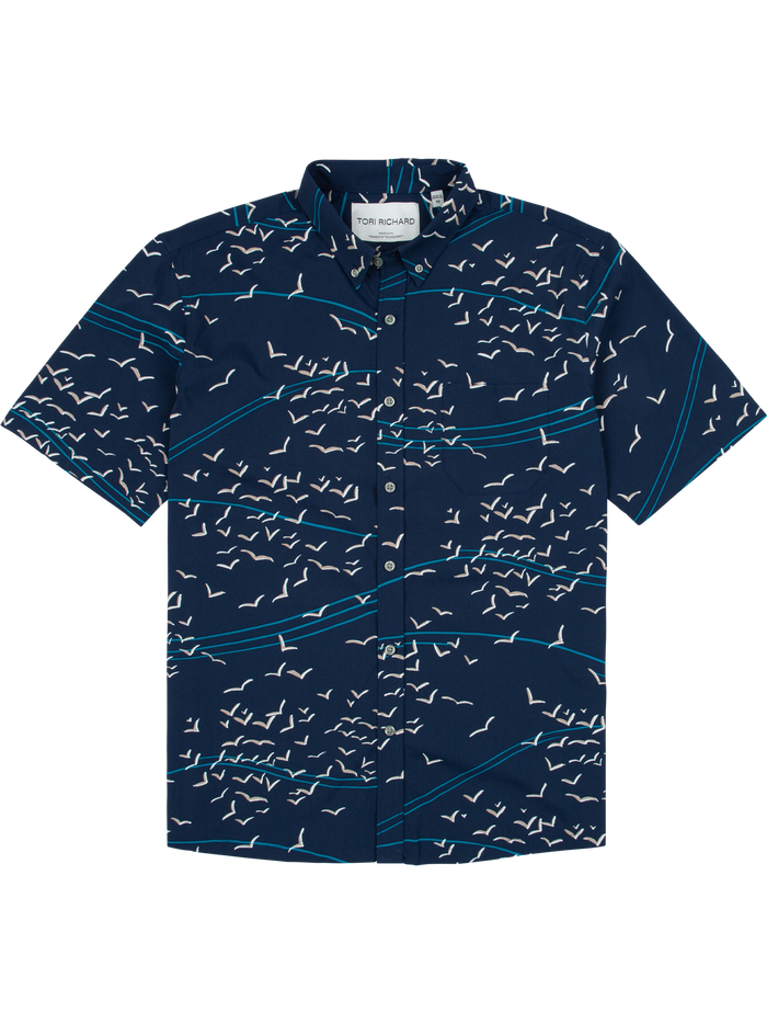 Navy short-sleeve shirt with white seagull print, Tradewind Technology, UPF protection, front view.