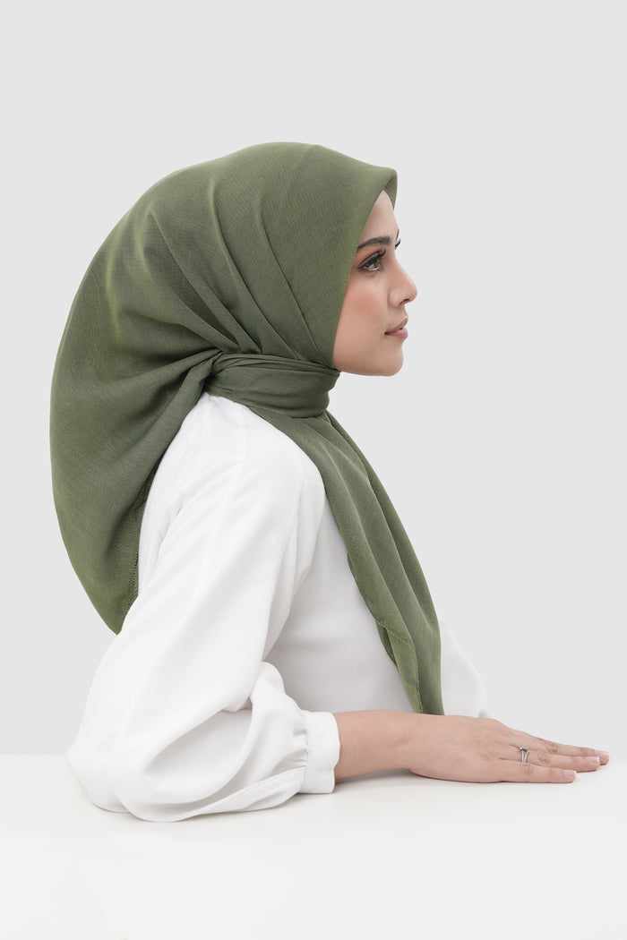 sunday basic square scarf in sage moss by buttonscarves side view