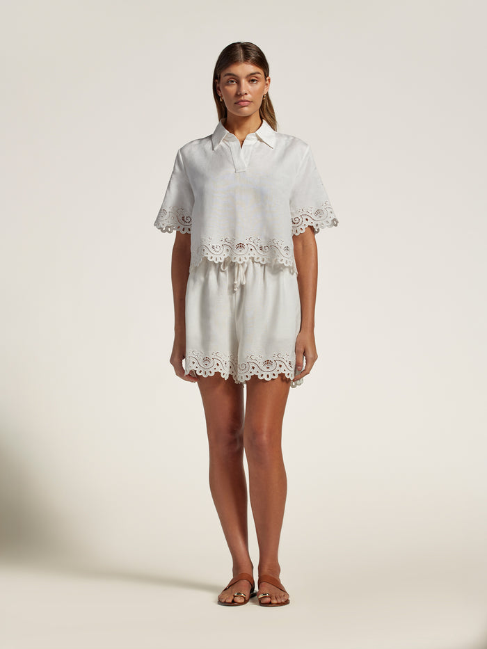 White linen top and white eyelet-hem embroidered shorts, front view shown in Images 1 and 2.