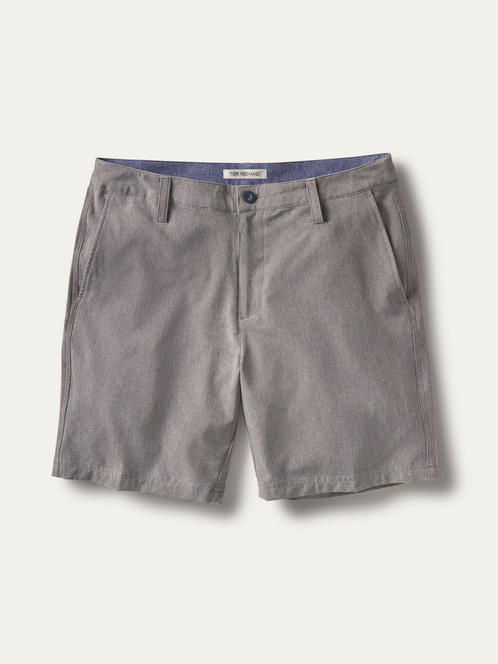 Gray performance shorts with quick-dry fabric, side pockets, and belt loops, front view.