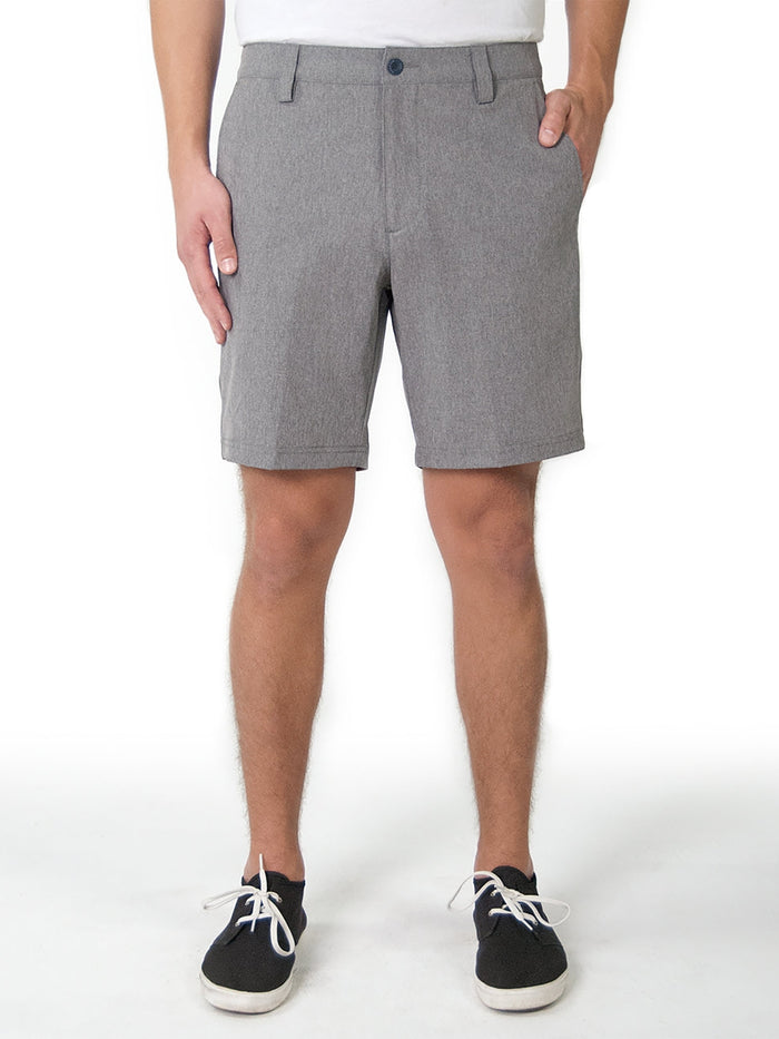 Gray solid performance shorts, full-body front view, white shirt and sneakers.