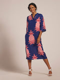 Blue caftan with pink pineapple print and kimono sleeves, front full-body view.