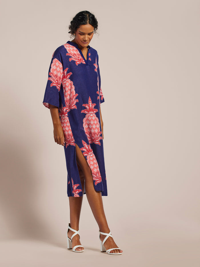Blue caftan with pink pattern and kimono sleeves, full front view.