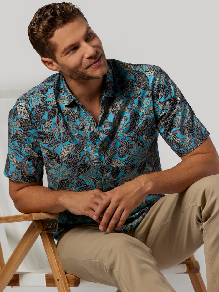 Blue Naupaka floral-print short-sleeve shirt, front view.