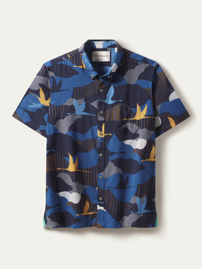 Blue and yellow crane and wave-print short-sleeve shirt, front view, Flat lay. UPF feature shown.