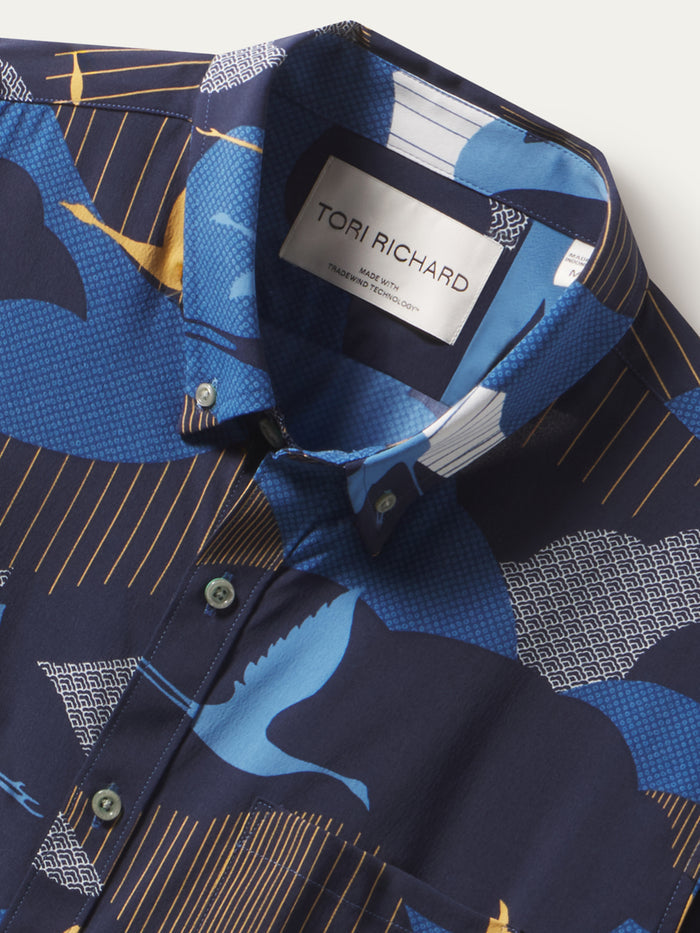 Blue and yellow crane-print- short-sleeve button-up shirt.   close-up of collar with Tori Richard label.