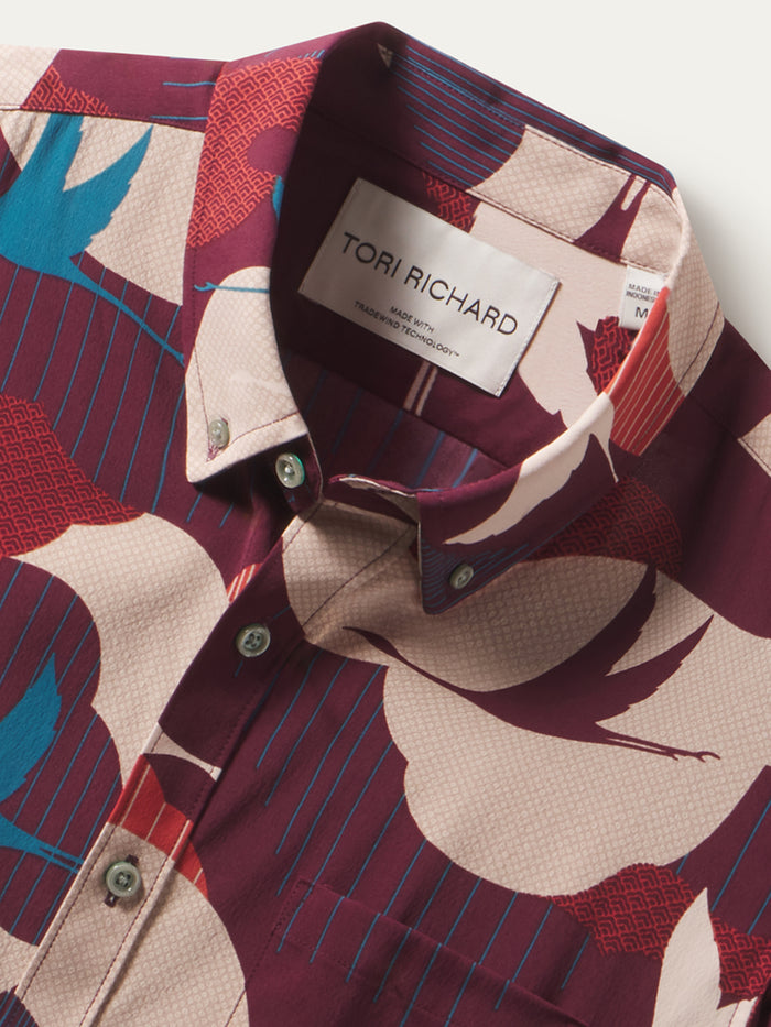 Maroon, cream, blue crane- abstract-print shirt, front view with UPF details. close-up of fabric and label.