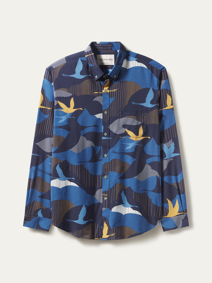 Blue and yellow crane-print long-sleeve button-up shirt. Flat lay front view.