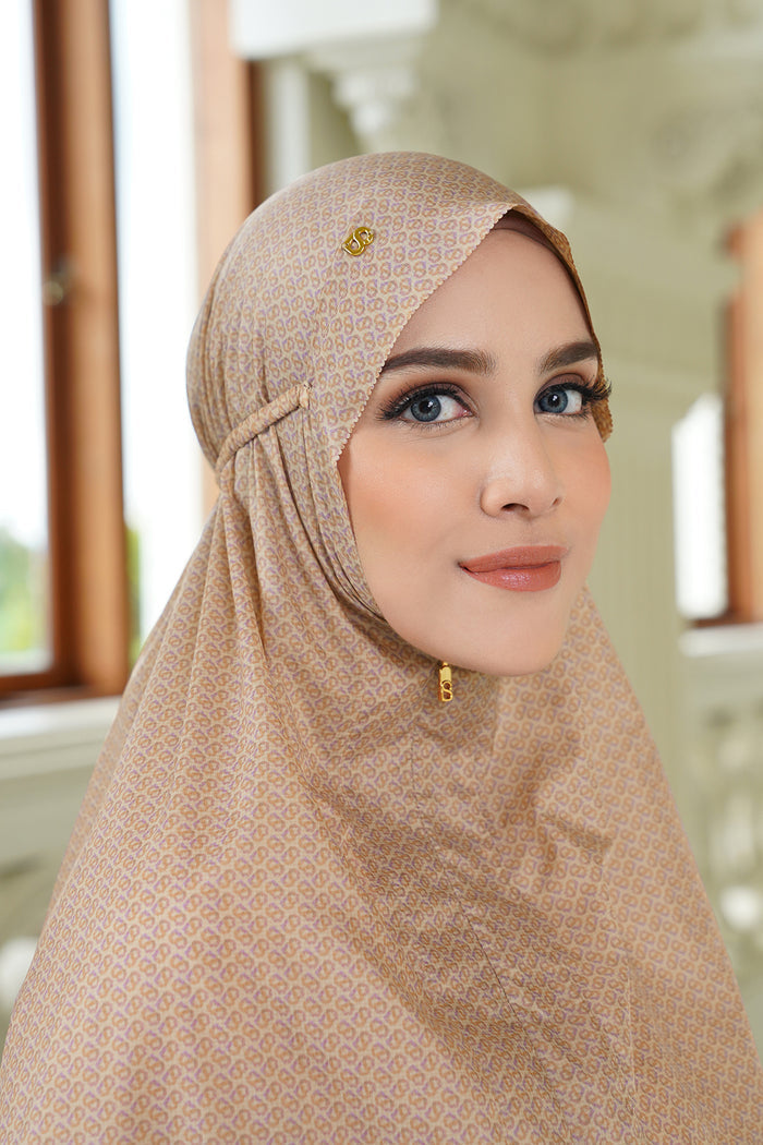 tapis de fleur capsule prayer robe in beige by buttonscarves with zipper under the chin