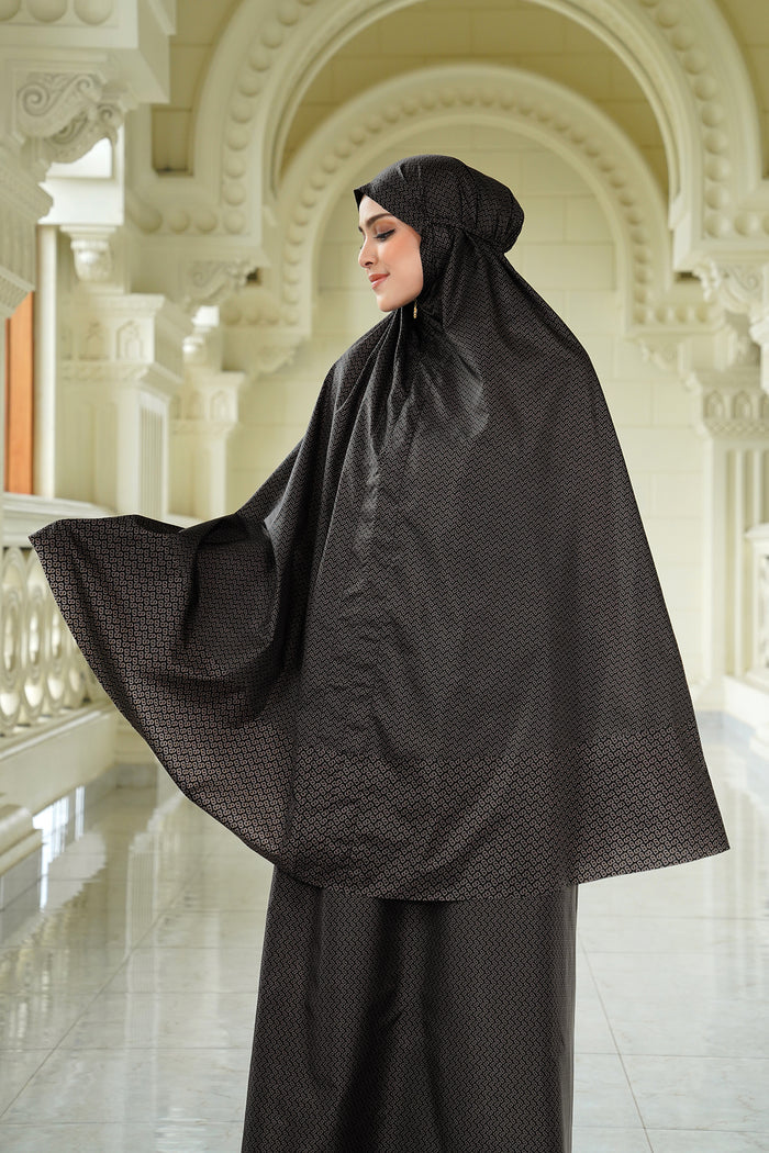 tapis de fleur capsule prayer robe in black by buttonscarves front view