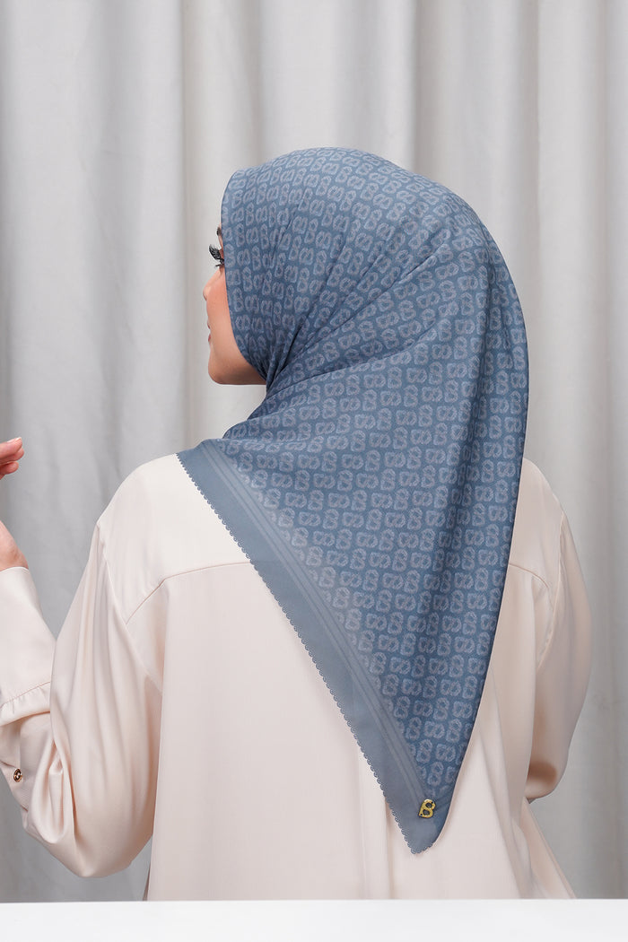 tapis de fleur square scarf in blue mirage by button scarves back view
