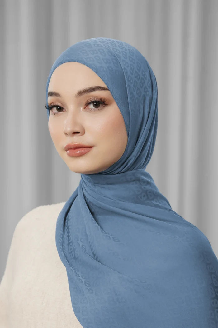 tapis satin jacquard shawl in denim by buttonscarves