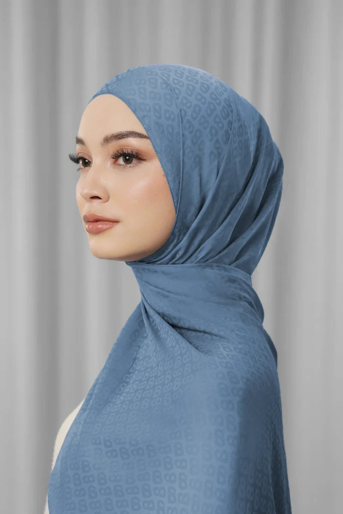 tapis satin jacquard shawl in denim by buttonscarves side view