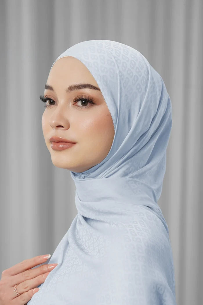 tapis satin jacquard shawl in zen blue by buttonscarves side view
