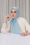 tapis square scarf in baby blue by buttonscarves front view