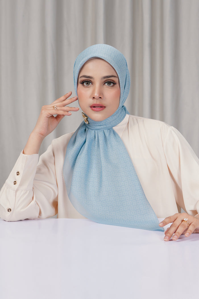 tapis square scarf in baby blue by buttonscarves front view