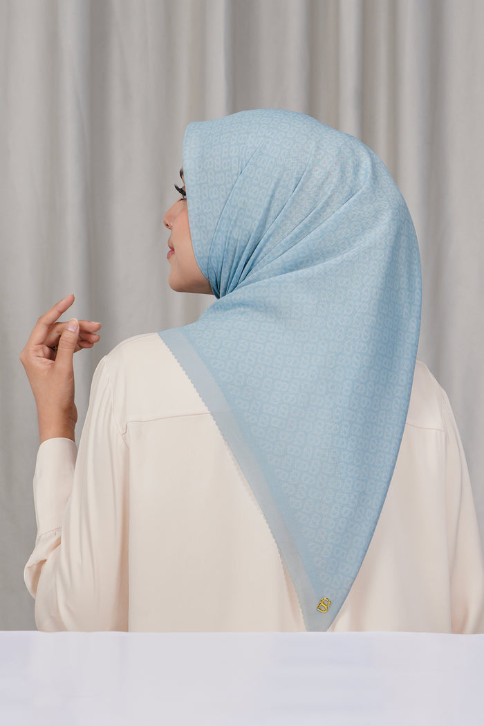 tapis square scarf in baby blue by buttonscarves back view