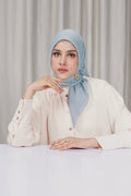 tapis square scarf in celestial blue by buttonscarves front view