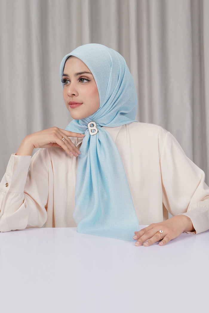 tapis square scarf in delicate blue by buttonscarves side view
