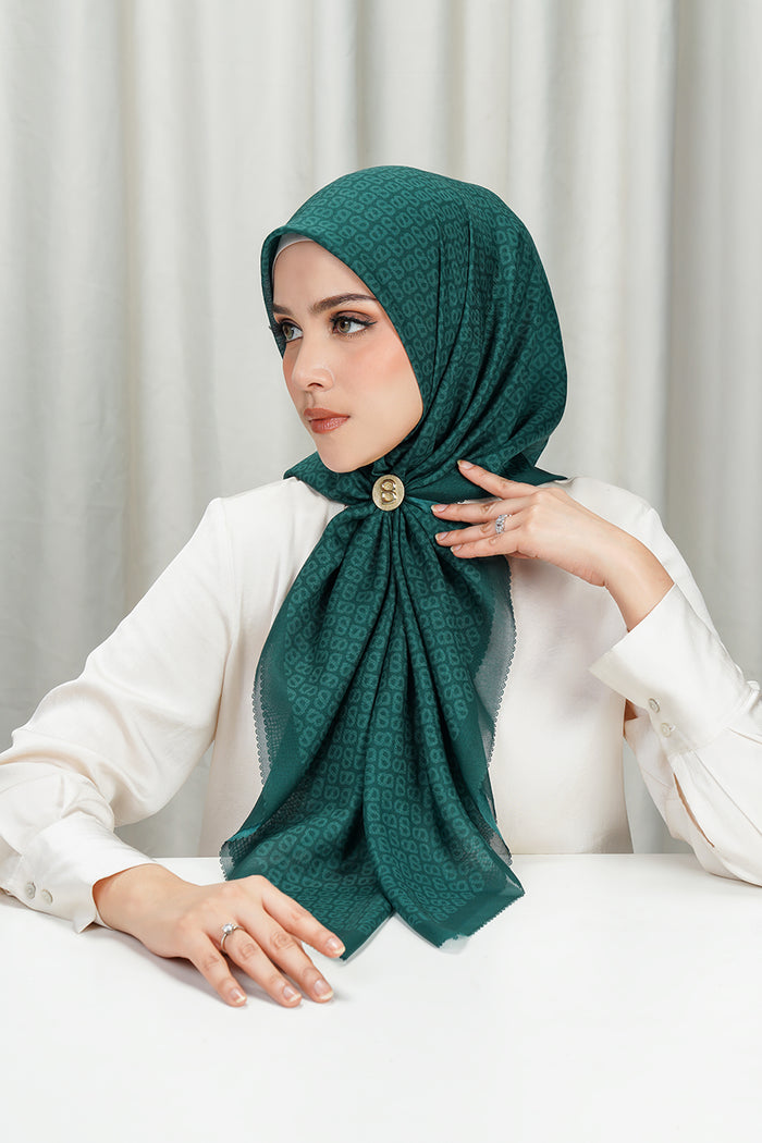 tapis square scarf in evergreen by buttonscarves side view