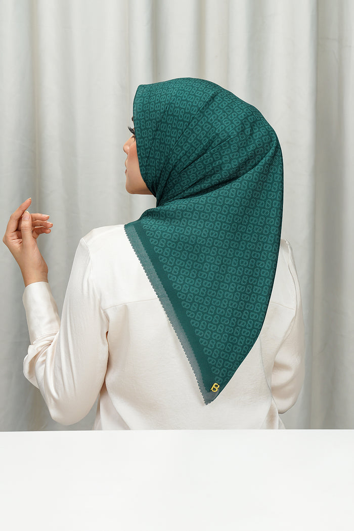 tapis square scarf in evergreen by buttonscarves back view