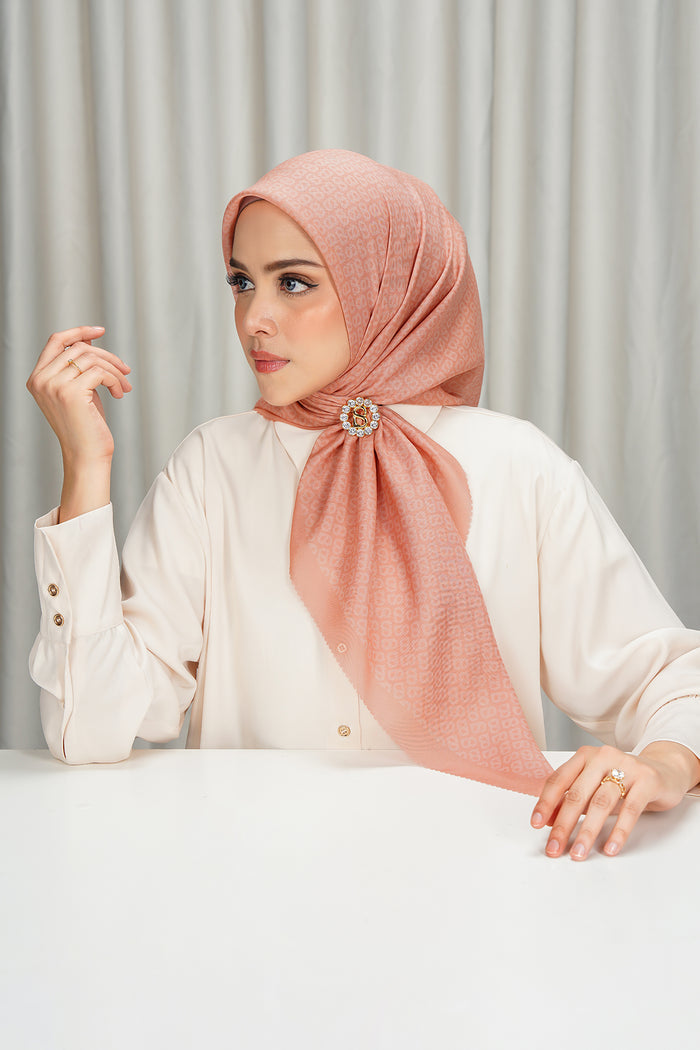 tapis square scarf in peach by buttonscarves side view