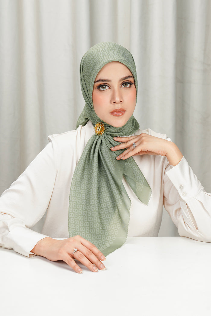 tapis square scarf in sage by buttonscarves front view
