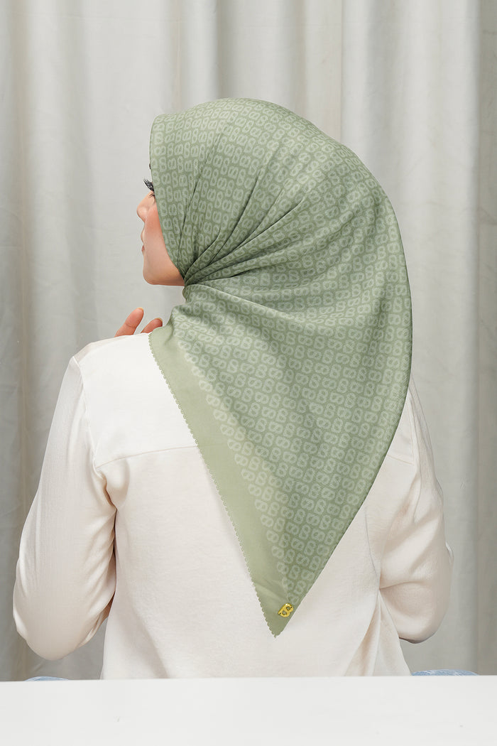 tapis square scarf in sage by buttonscarves back view