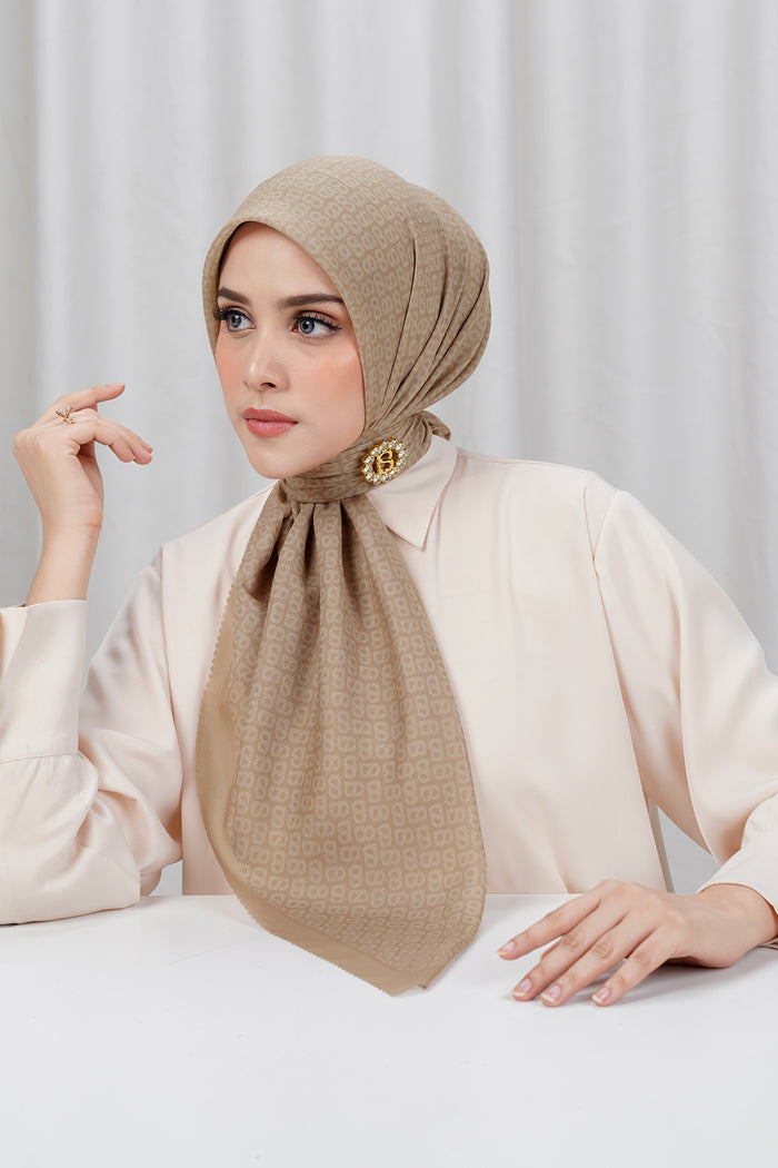tapis square scarf in sand by buttonscarves side view