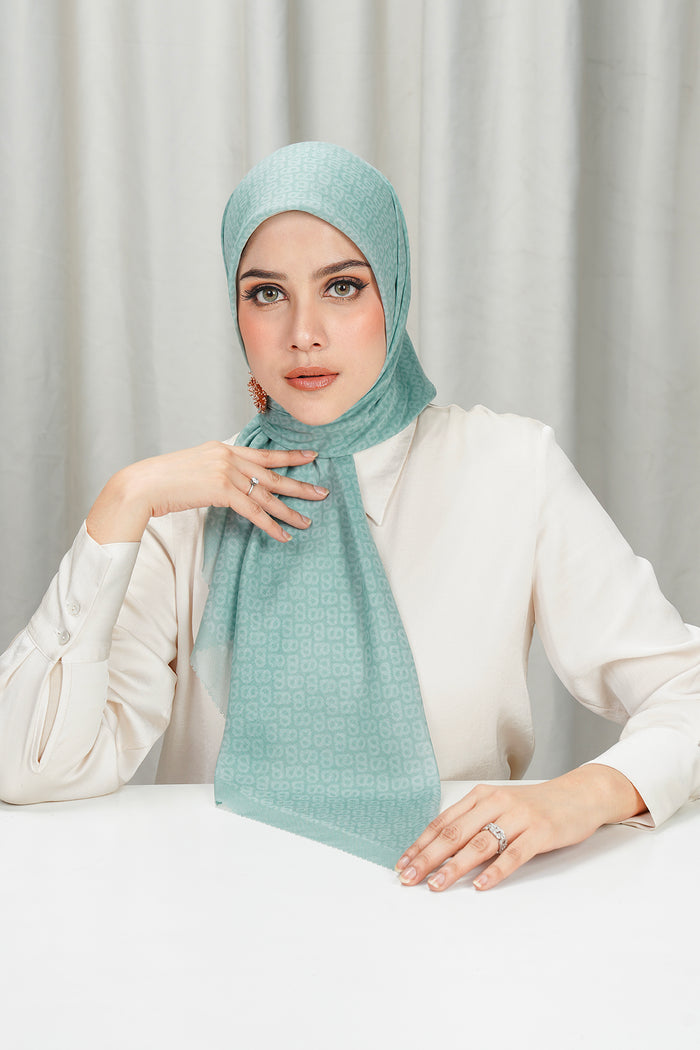 tapis square scarf in silt green by buttonscarves front view