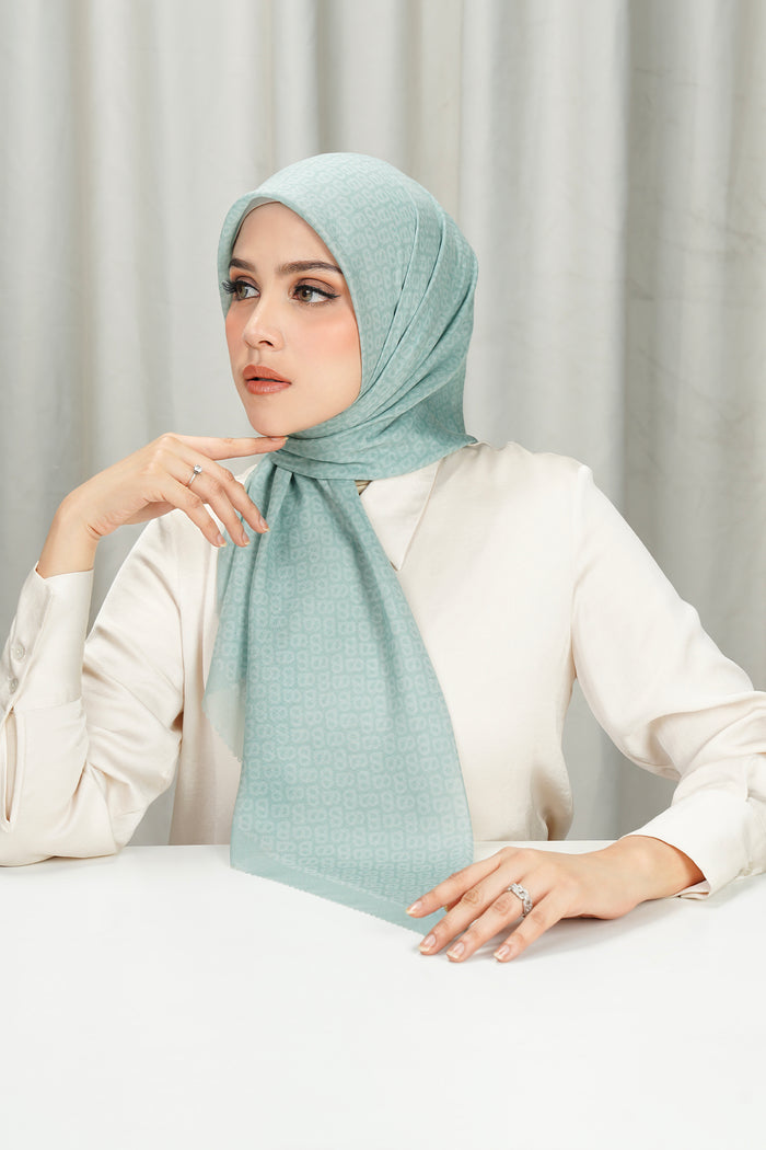 tapis square scarf in silt green by buttonscarves side view