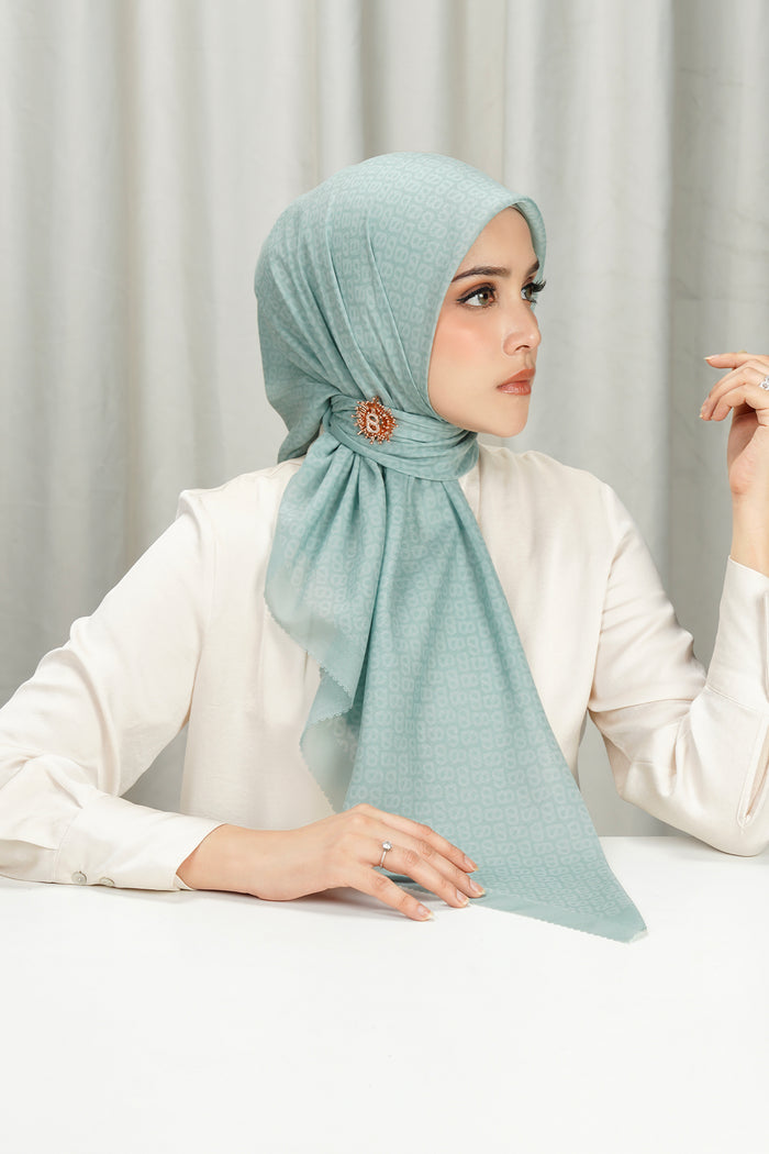 tapis square scarf in silt green by buttonscarves side view