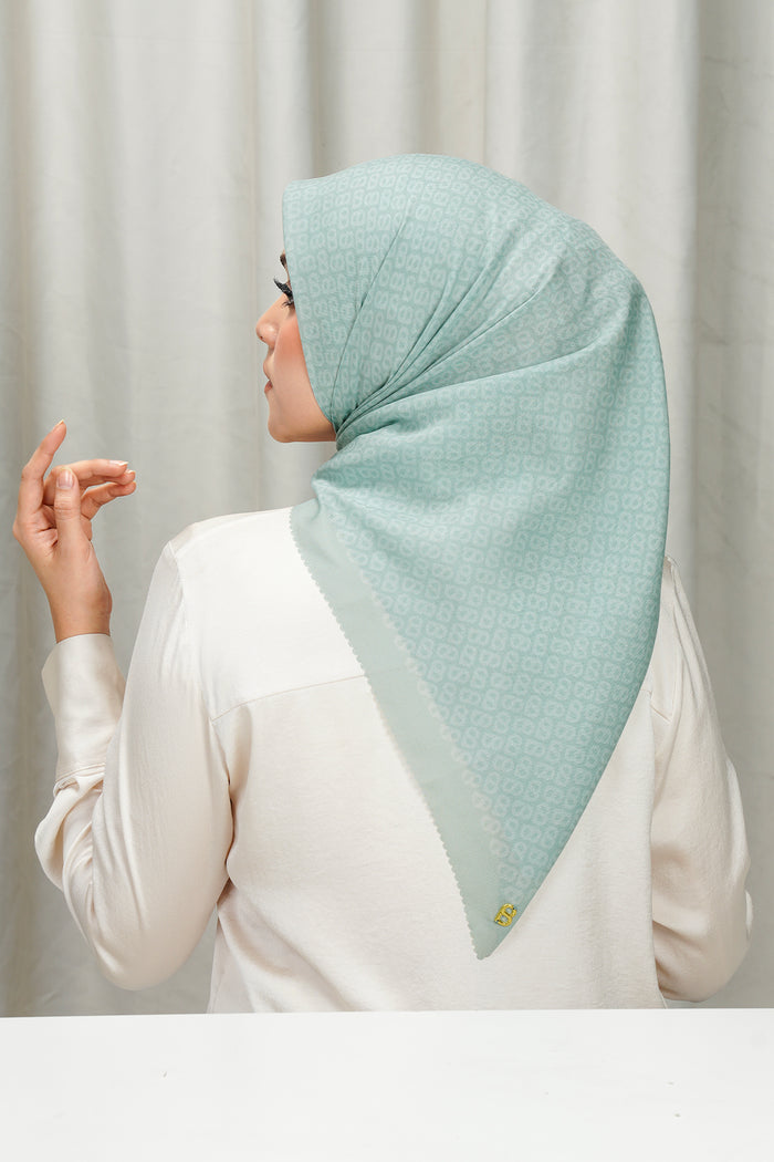 tapis square scarf in silt green by buttonscarves back view