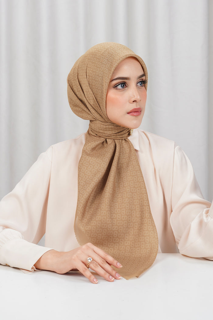 tapis square scarf in tan by buttonscarves side view