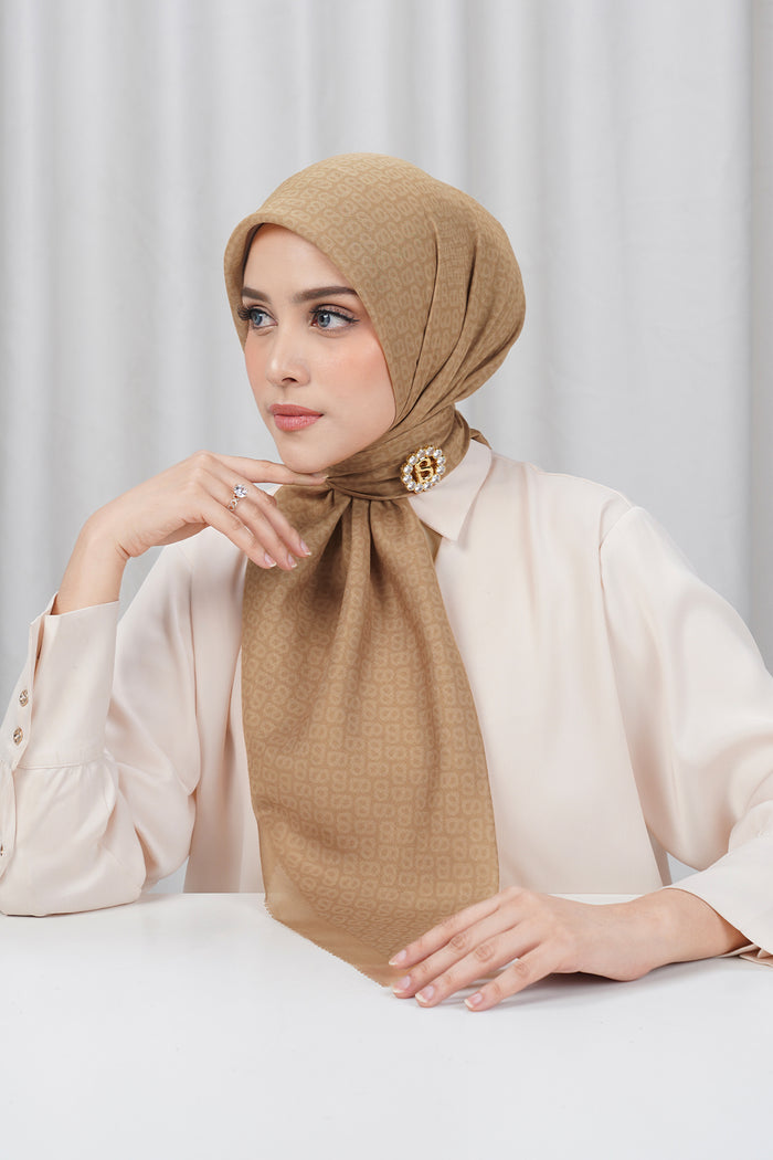 tapis square scarf in tan by buttonscarves side view