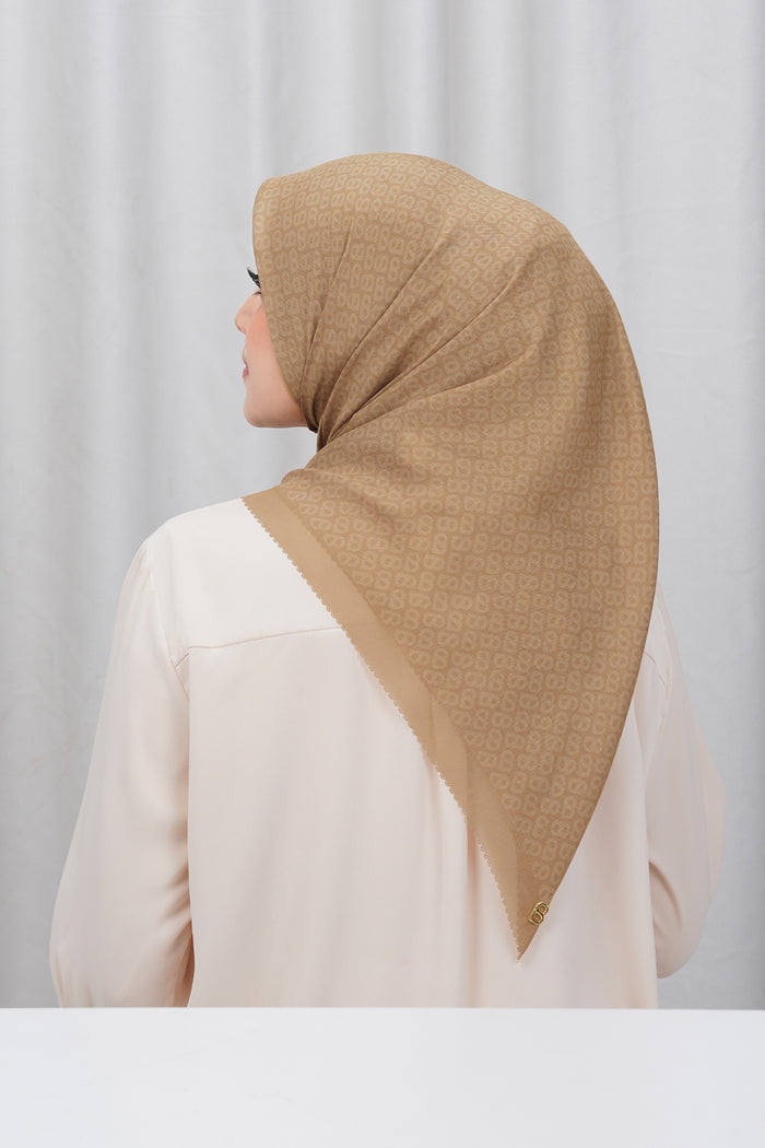 tapis square scarf in tan by buttonscarves back view