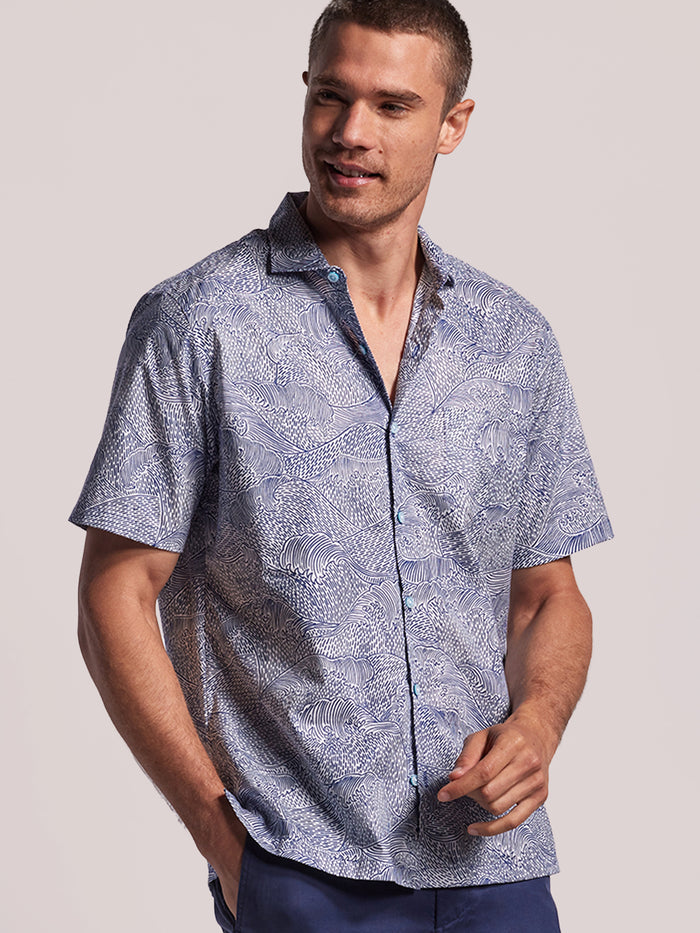 Tendensea blue and white wave-print cotton shirt with short sleeves, shown from the front.
