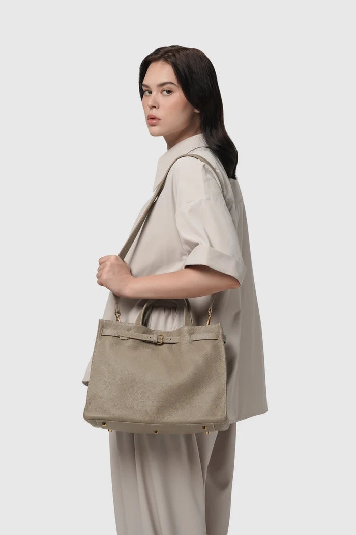 the city bag medium in clunch by buttonscarves carried on shoulder