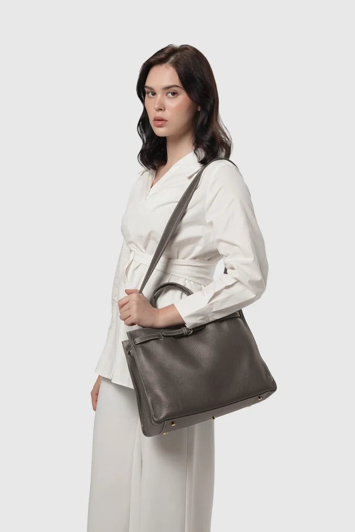 the city bag medium in testa di moro by buttonscarves carried on shoulder