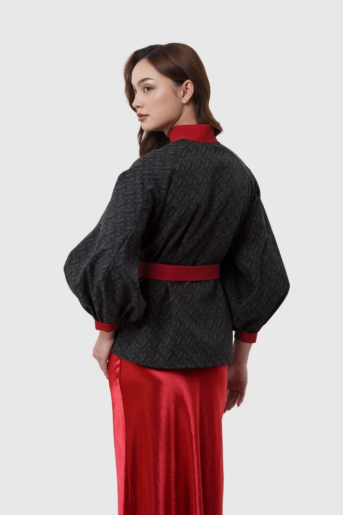 the editor puff shirt in black by buttonscarves x the devil wears prada 2 back view