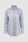 the editor satin shirt in grey by buttonscarves x the devil wears prada 2