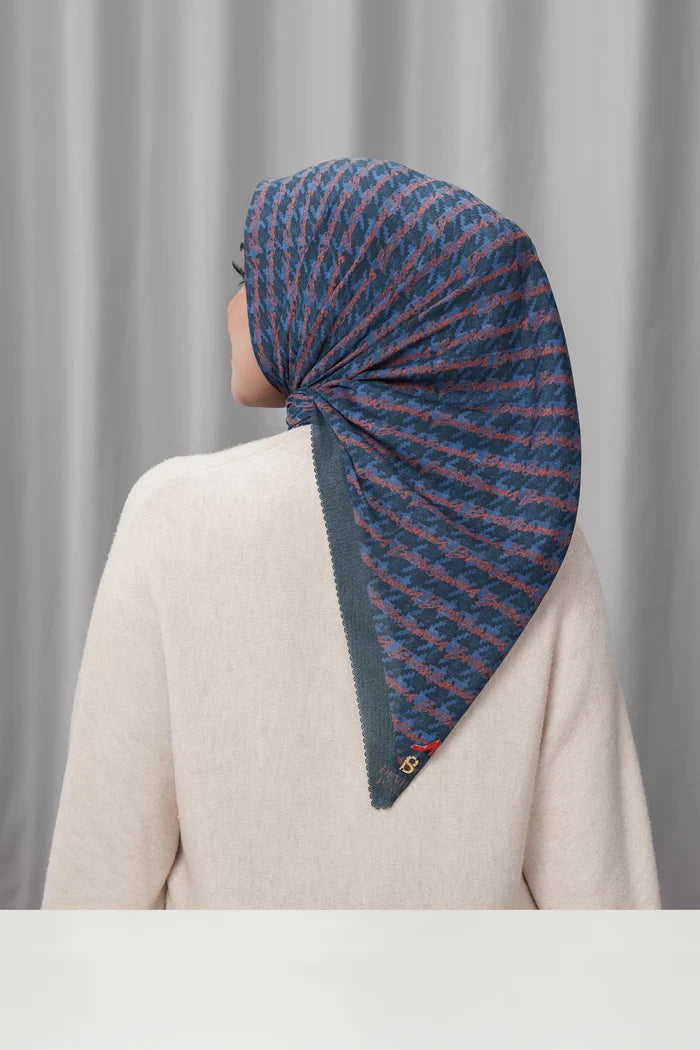 the editor square scarf in broadway by buttonscarves x the devil wears prada 2 back view
