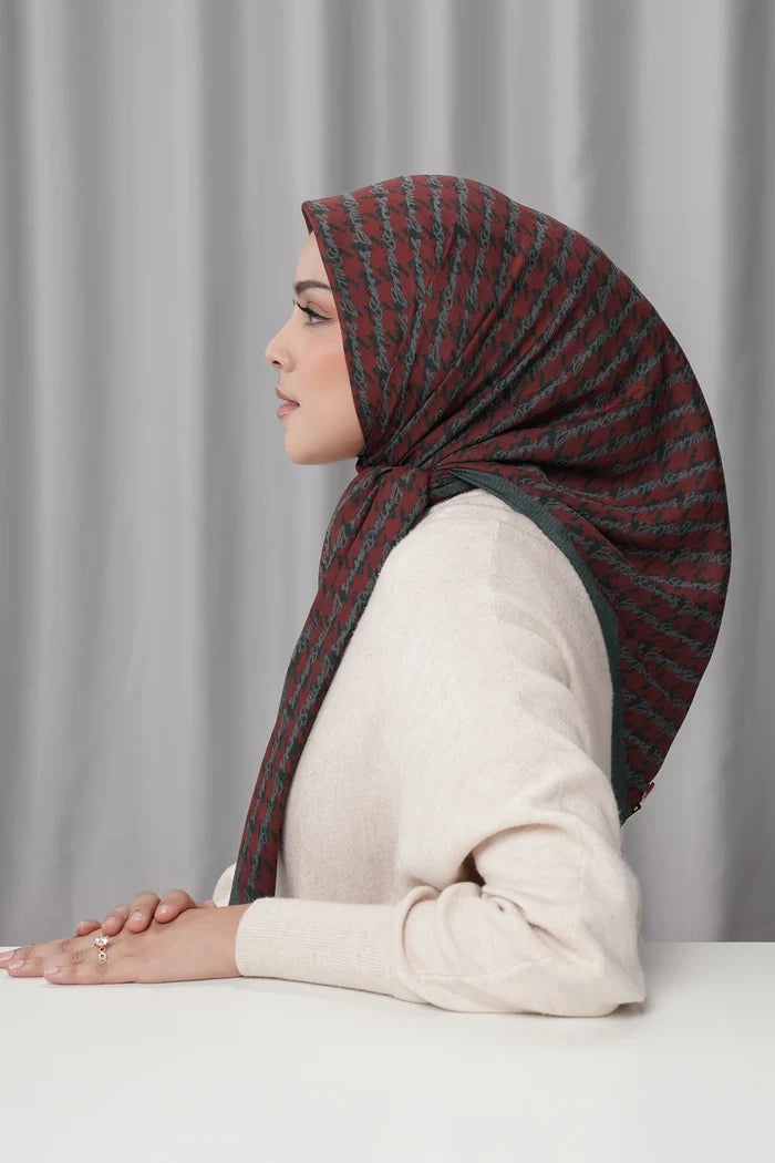 the editor square scarf in rouge by buttonscarves x the devil wears prada 2 side view
