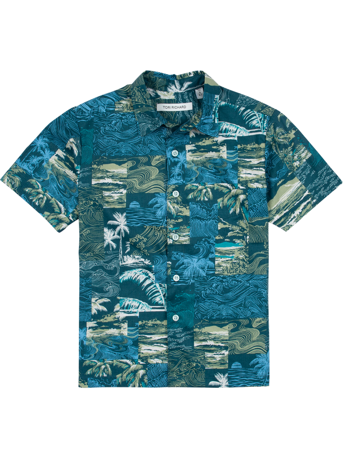 Blue-green tropical print short-sleeve shirt with white buttons, front view.